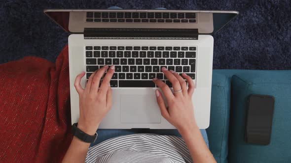 Caucasian woman using a laptop