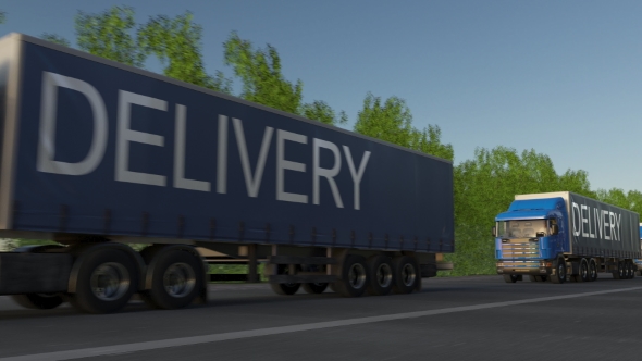 Speeding Freight Semi Truck with DELIVERY Caption on the Trailer alt