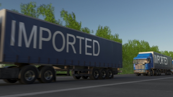 Speeding Freight Semi Truck with IMPORTED Caption on the Trailer alt