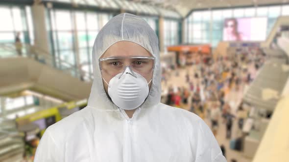Man in White Respiratory Mask and Clothing Looking Around
