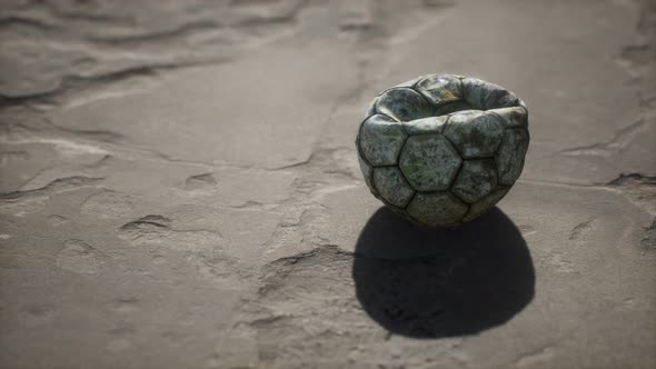 Old Soccer Ball Cement Floor