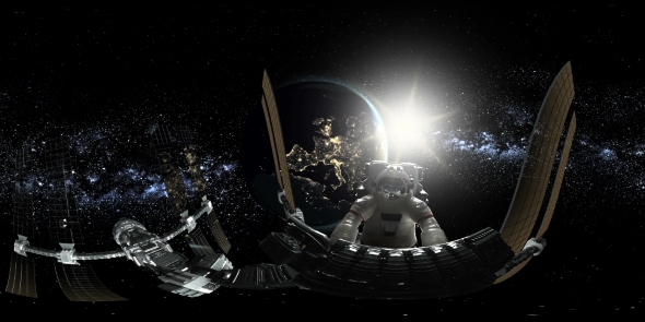 Astronaut and International Space Station Orbiting Earth in Virtual Reality alt