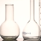 Empty Chemical Glass Flasks and Test Tube Reflecting on the Surface - VideoHive Item for Sale