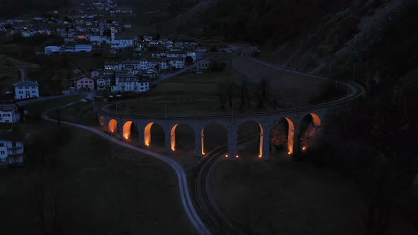 Illuminated Brusio Spiral Viaduct in Switzerland