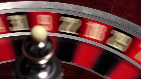 Classic Casino Roulette Wheel, on Black, Ball White