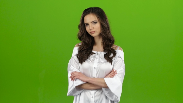 Girl Is Sexually Flirting, Biting Her Lip and Winking. Green Screen