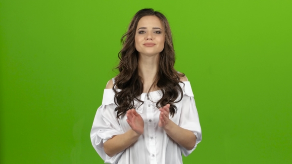 Brunette Stands and Applauds a Good Performance, She Is Happy. Green Screen