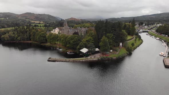 Epic reveal of Fort Augustus and Loch Ness, Scotland, aerial wide