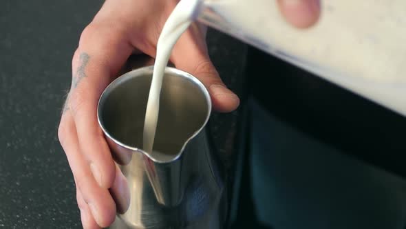 Barista Pours Milk Making Cappuccino or Latte