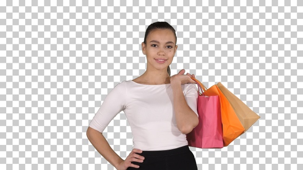 Let's go shopping! Woman walking with shopping bags, Alpha Channel