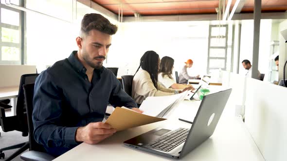 Man working with documents in office