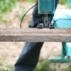 Man Saws a Board Using a Jig Saw - VideoHive Item for Sale
