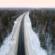 Intercity Highway Among Woodland at Sunset in Winter - VideoHive Item for Sale