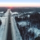 Intercity Highway Among Woodland at Sunset in Winter - VideoHive Item for Sale