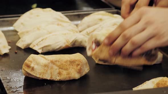 Mexican Tacos Shells with Beef Meat on Street Food Festival Onion Chef Cooking on Grill Traditional