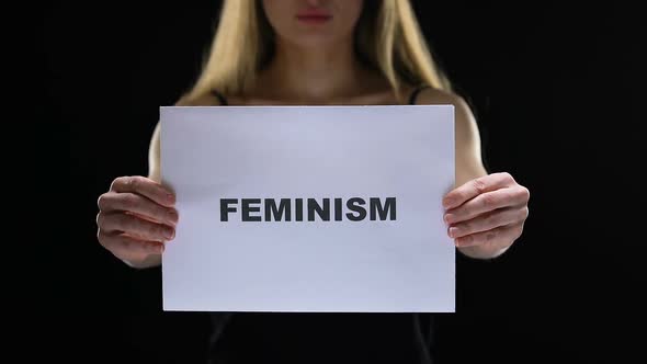 Lady Holding Feminism Sign, Struggling for Female Social Rights and Equality