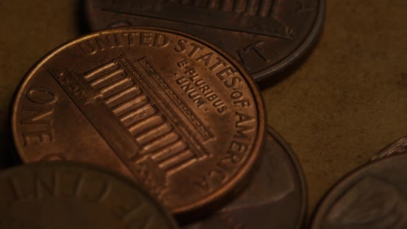 Rotating stock footage shot of American pennies (coin - $0.01) - MONEY 0177