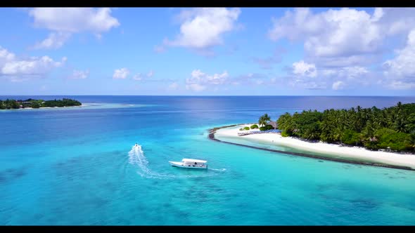 Aerial above tourism of paradise tourist beach vacation by blue green ocean and white sand backgroun