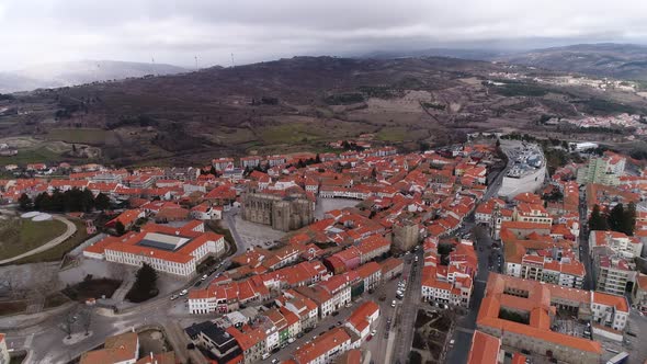 Drone view reveals layout of Guarda city surrounding the Guarda Cathedral