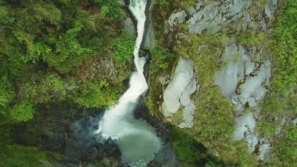Beautiful waterfall spiral overhead shot