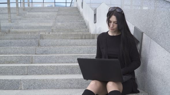 Woman Using a Laptop