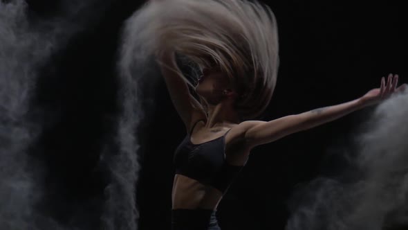 Close-up Slow Motion, Talanted Dancer Throwing Dust Particles in Air