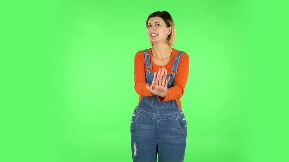 Woman Strictly Gesturing with Hands Shape Meaning Denial Saying NO. Green Screen