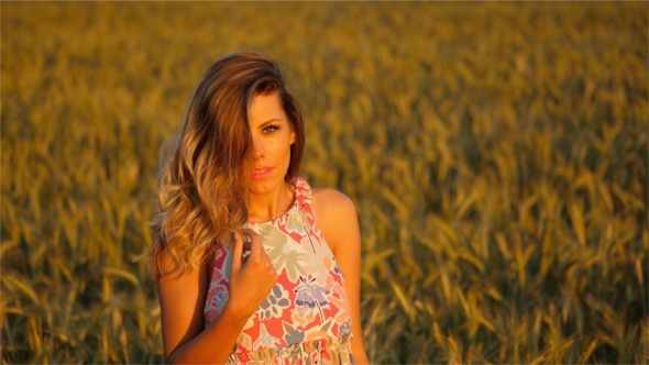 Blonde in Front of The Camera at Sunset