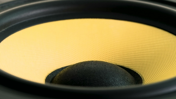 Moving Sub-woofer. Speaker Part. Black and Yellow Colors of Membrane. Concept of Musical