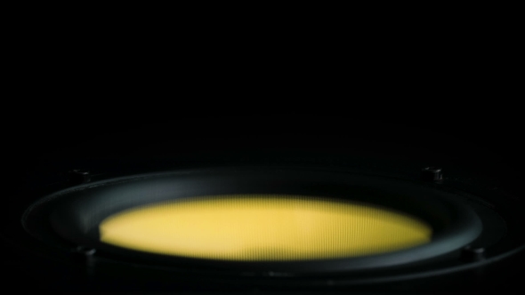 Moving Sub-woofer. Speaker Part. Black and Yellow Colors of Membrane. Concept of Musical