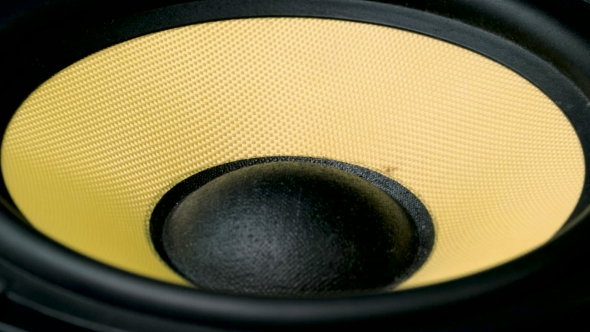 Moving Sub-woofer. Speaker Part. Black and Yellow Colors of Membrane. Concept of Musical