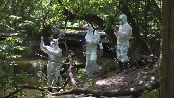 Three Bio Technicians Testing for Pollutants