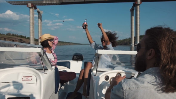 Group of Happy Women Relaxing on Board a Boat