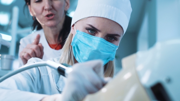 Young Woman Practicing Dental Activity