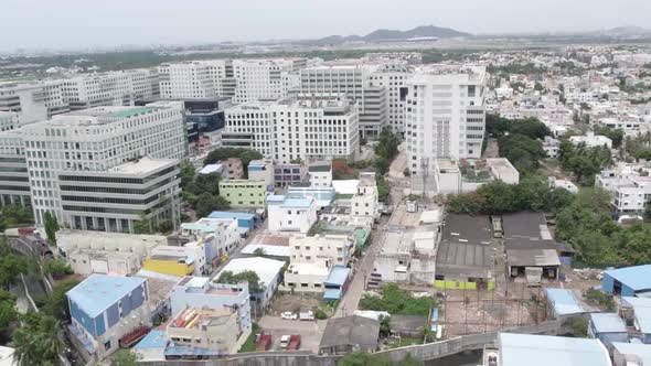 Aerial view of an Indian city which has residential and Special economic zone (Tech park) in same ar
