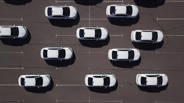 Aerial View Over Cars in Parking