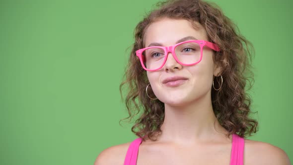 Young Happy Beautiful Nerd Woman Smiling with Eyeglasses