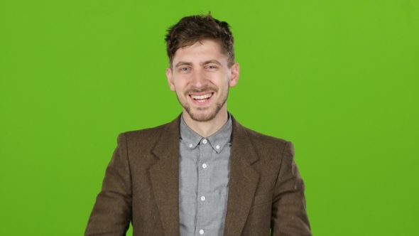 Guy Is Having Fun and Showing the Language To People. Green Screen