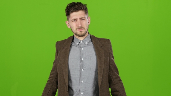 Guy Businessman Is Very Tired of Working, and Yawns, Wants To Sleep. Green Screen