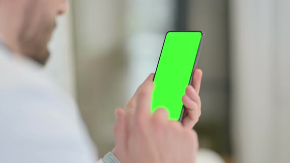 Rear View Young Man Using Smartphone Chroma Screen