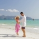 Сouple Walking On Beach, Girl Holding Man Hand Embracing, Tourists In Love On Summer Holiday - VideoHive Item for Sale