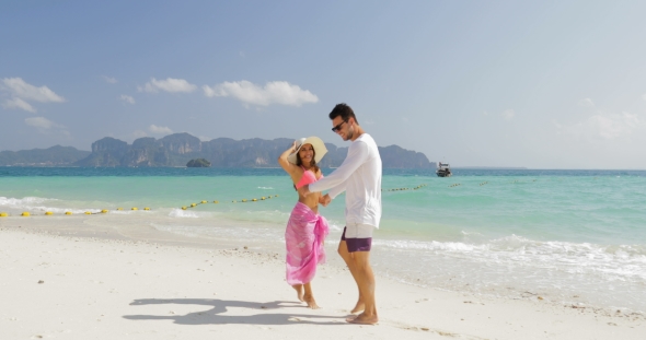 Сouple Walking On Beach, Girl Holding Man Hand Embracing, Tourists In Love On Summer Holiday
