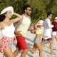 Happy People Running To Water Raising Hands On Beach, Mix Race Man And Woman Group Tourists - VideoHive Item for Sale