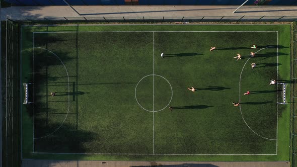 Top View of a Sports Soccer Field with People Playing Soccer.a Small Football Field on the Street in