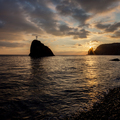 Seashore at sunset. Rock of the holy phenomenon. - PhotoDune Item for Sale