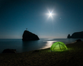 Tent on the beach with rocks and a night sky with stars - PhotoDune Item for Sale