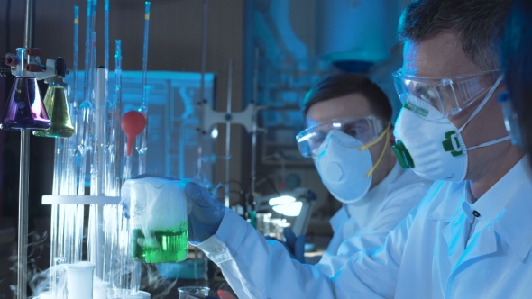 Group of Chemists Working in a Laboratory