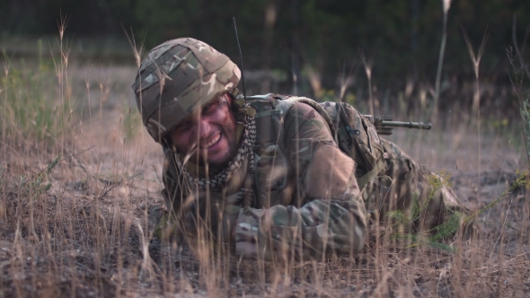 Soldier Crawling in Field