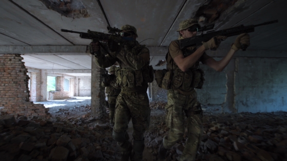 Men with Guns Entering Abandoned Building