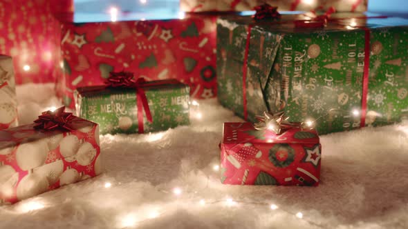 close up of christmas gifts under the tree